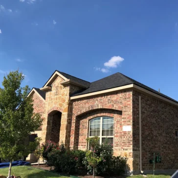 Roofing repairs on a home from storm damage in DFW