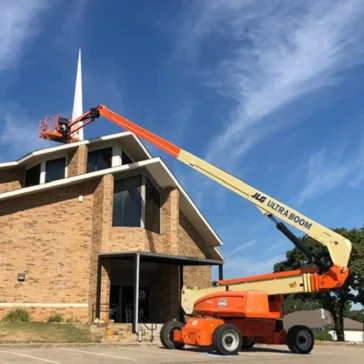 Roofing repairs on a church from storm damage in DFW