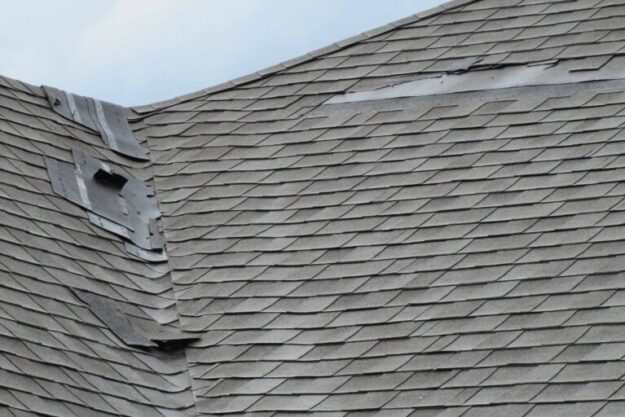 shingle damage on the roof of a home