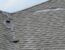 shingle damage on the roof of a home