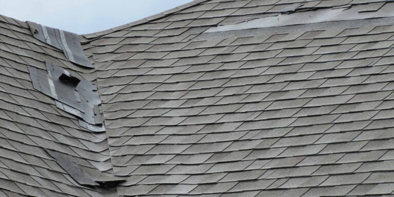 shingle damage on the roof of a home